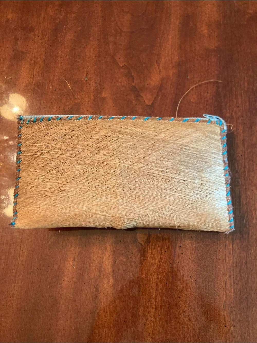 Handcrafted Natural Hair-On Hide Clutch with Turquoise Stitching